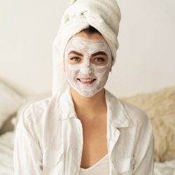 beautiful-woman-applying-facial-mask.jpg