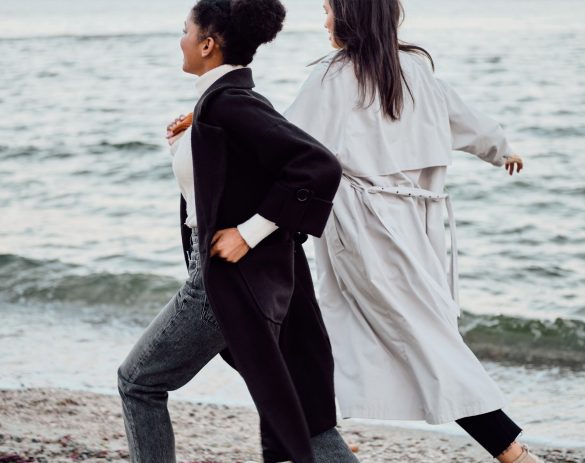 two-attractive-stylish-girls-in-trench-coats-happi-S8SUAFT.jpg