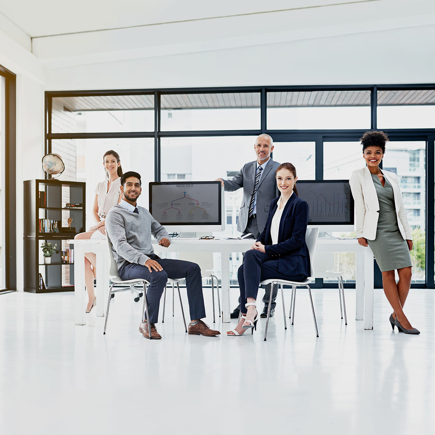 portrait-of-a-group-of-businesspeople-standing-tog-2023-01-10-23-03-39-utc.jpg