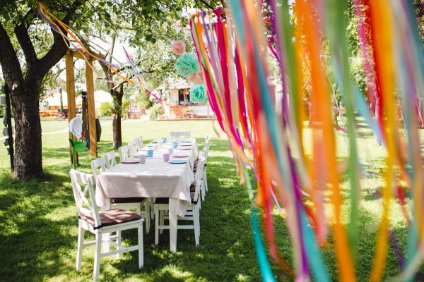 a-table-set-for-kids-birthday-party-outdoors-in-garden-in-summer-.jpg